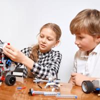 Kids building robot with magnetic blocks