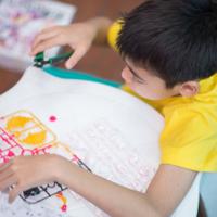 Boy building model kit