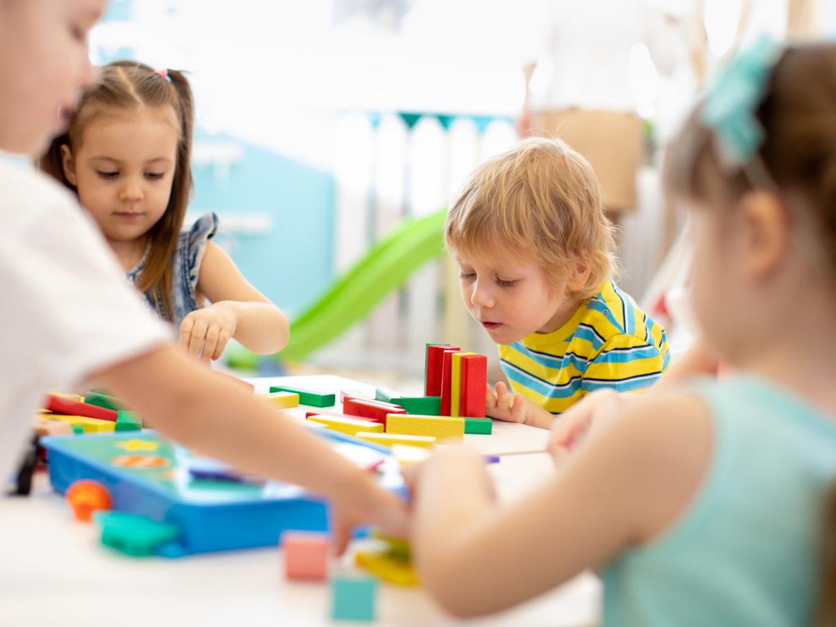 Kindergarten children playing with blocks