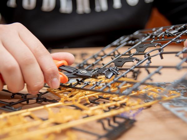 Boy building plastic model kit